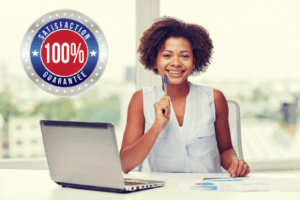 Woman at computer writing a 5-star review for Ecosuds Carpet and Upholstery Care